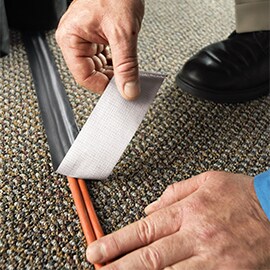 Scotch® EXTREMIUM™ Gewebe- und Reparaturband zur Sicherung eines Kabels verwendet